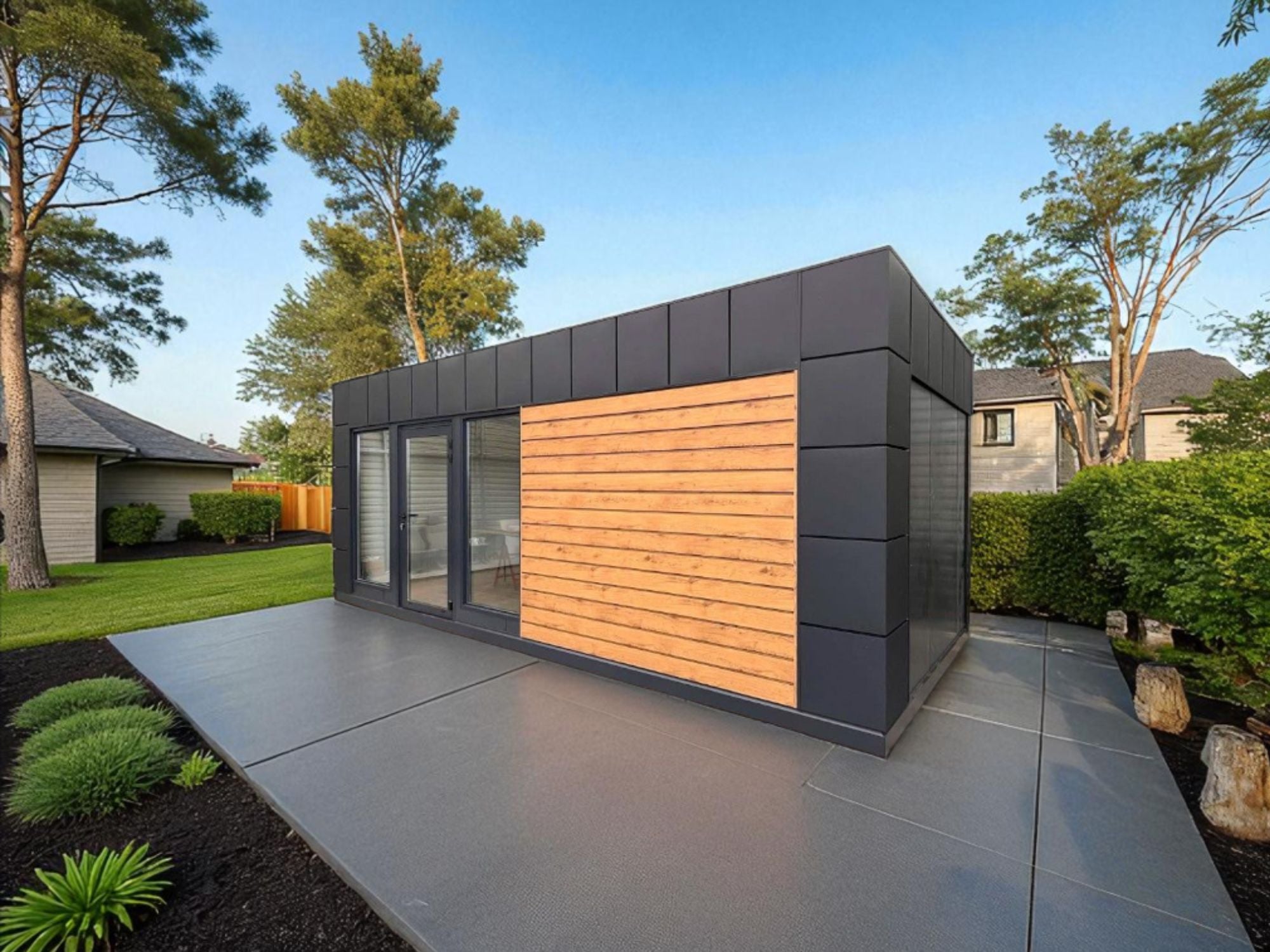 Créez votre lieu idéal avec ce studio de jardin moderne. Sa façade en bois et aluminium, ses finitions soignées et sa luminosité naturelle offrent un cadre harmonieux et fonctionnel, dès 17 880 €.